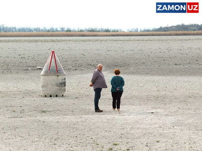 Австрияда одамлар қуриган кўл тубидан танга қидирмоқда