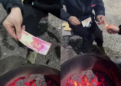 Сўмни ёқиб сигарет тутатган хорижликларнинг ҳар бири 41,2 млн сўм жаримага тортилди