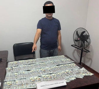Farg‘onada soliq idorasi xodimi 30 ming dollar pora bilan ushlandi